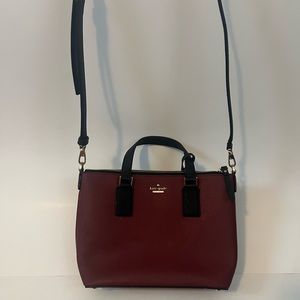 Kate spade leather top handle bag with shoulder strap. Maroon / burgundy